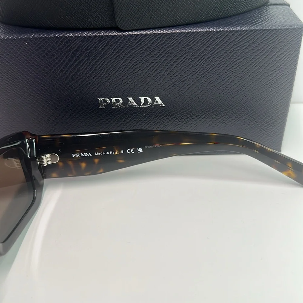 Prada PR06YS Brown Sunglasses with Bold Frames and UV Protection